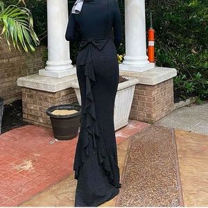 Black shimmery backless dress to attend wedding or prom